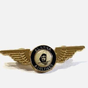 Alaska Airlines Winged With Face On Plane Tail Lapel Pin Brooch